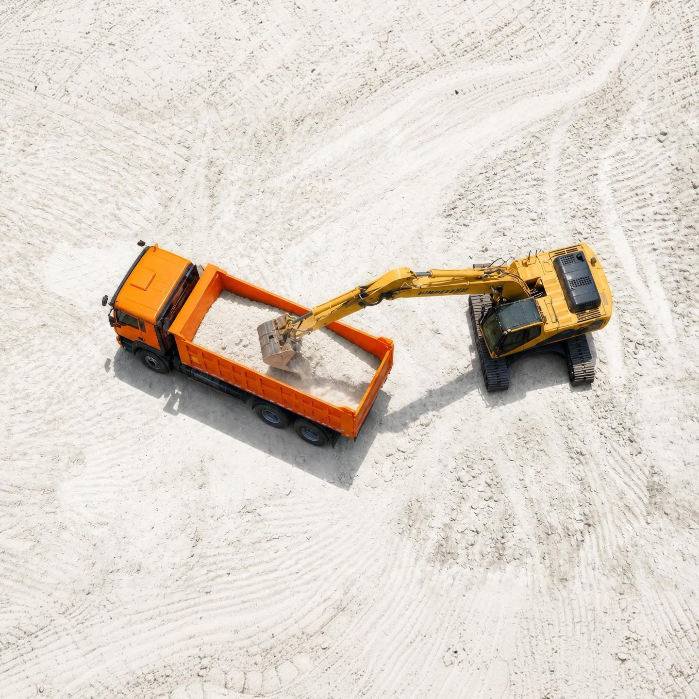Excavator loading a Saturn dump truck